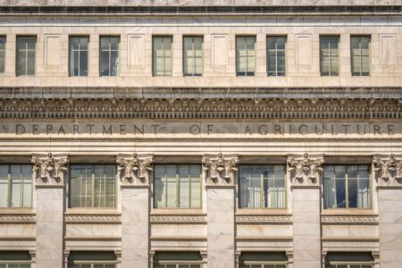 Defense Contractor Hiring Surge Strains Cleared Workforce Pipeline Federal government office building exterior representing defense contracting agencies