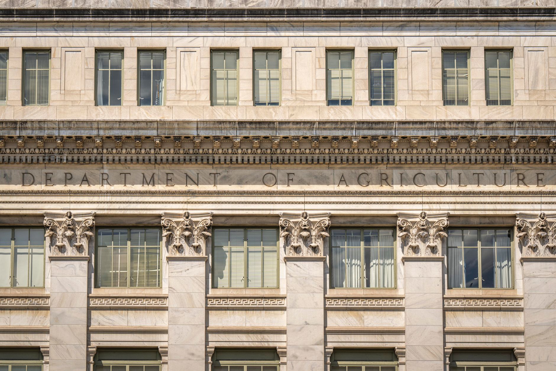 Federal government office building exterior representing defense contracting agencies