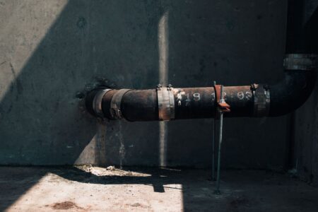 Aging underground water pipes exposed during infrastructure replacement work