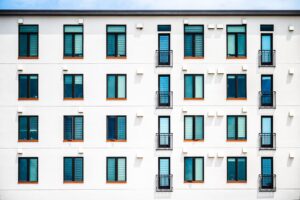 Small Landlords Exit Rental Market as Carrying Costs Spike Small residential rental property with a for sale sign out front