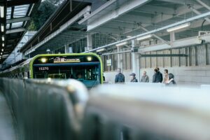 Transit Agency Fare Hikes Strain Riders as Federal Grants Dry Up Commuters waiting on a busy urban subway platform during rush hour