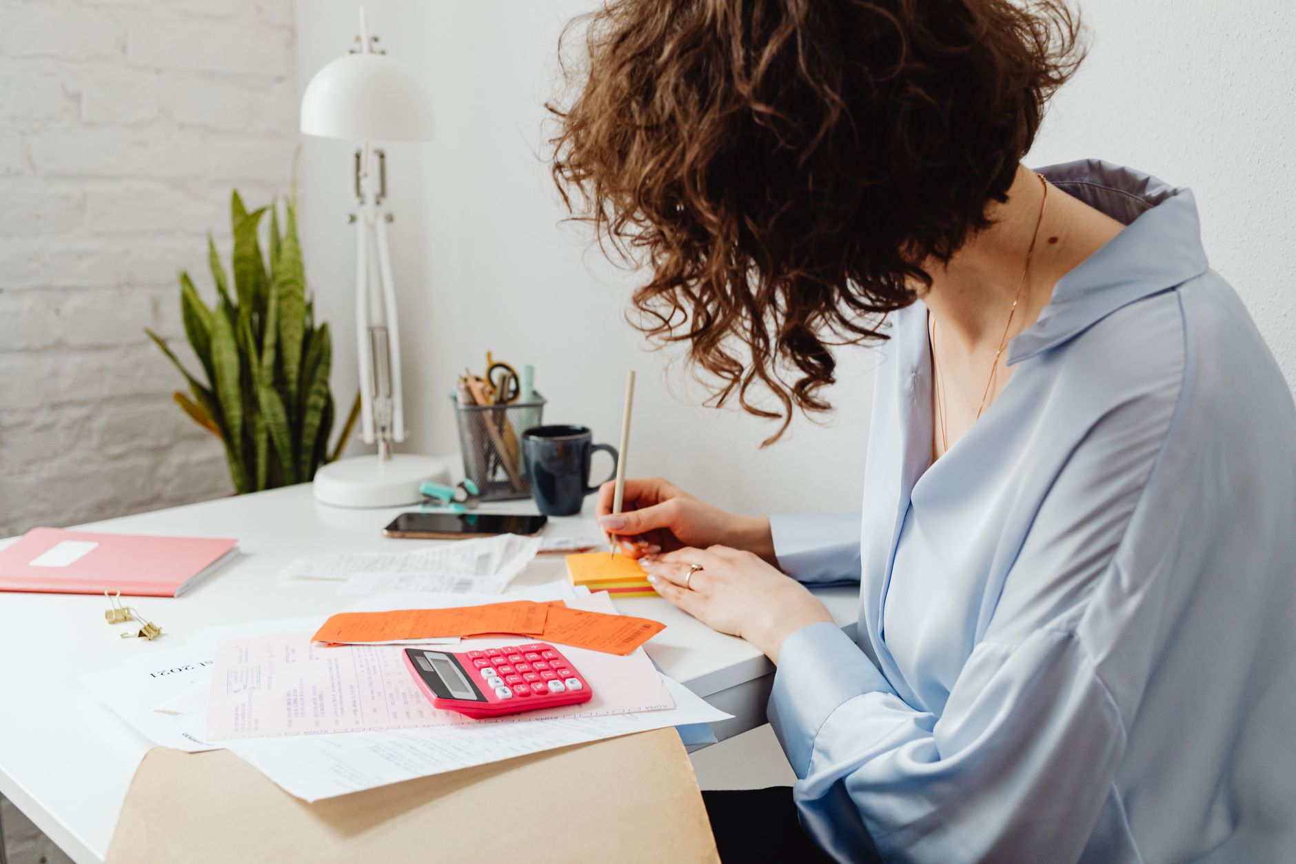 Financial aid paperwork and documents spread across a desk