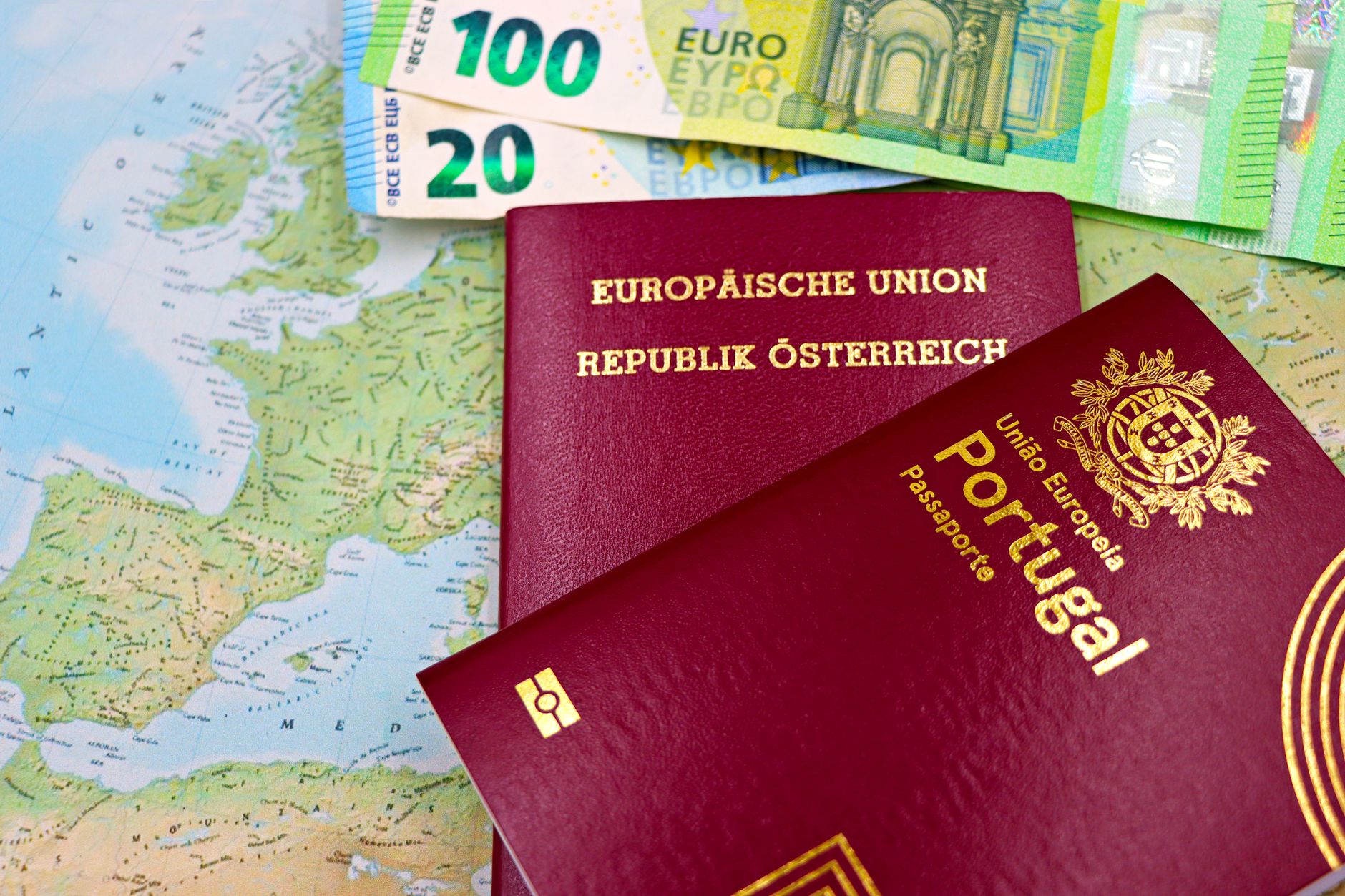 Passport and official documents spread on a desk representing visa and immigration paperwork