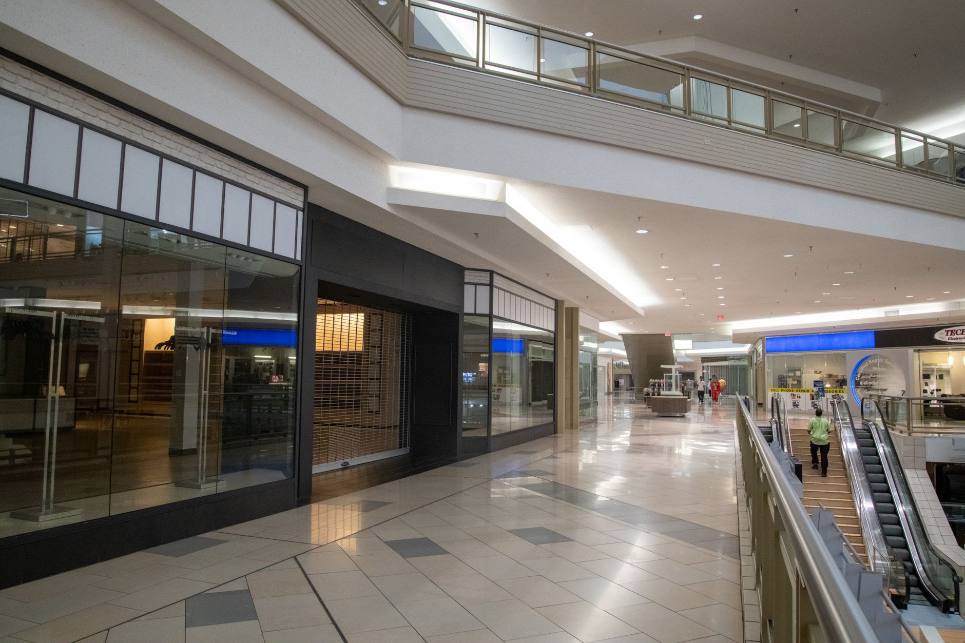 Empty retail store aisle reflecting slow consumer spending environment