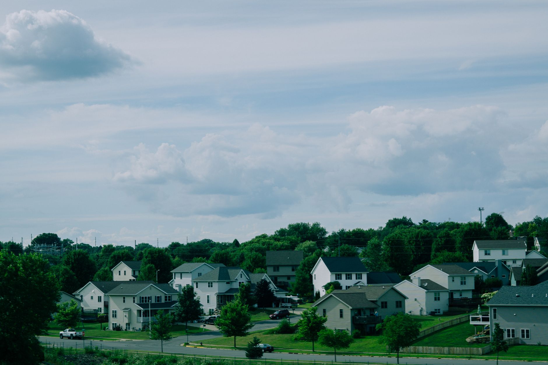 Row of suburban homes representing the U.S. residential real estate market