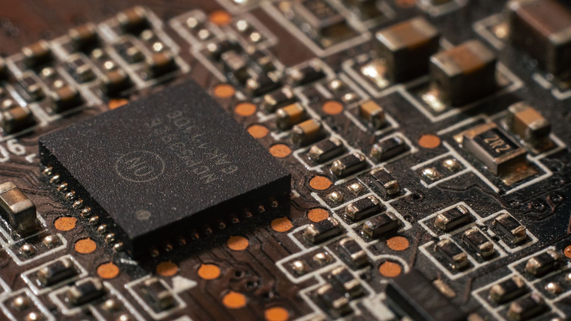 Close-up of a semiconductor microchip on a circuit board