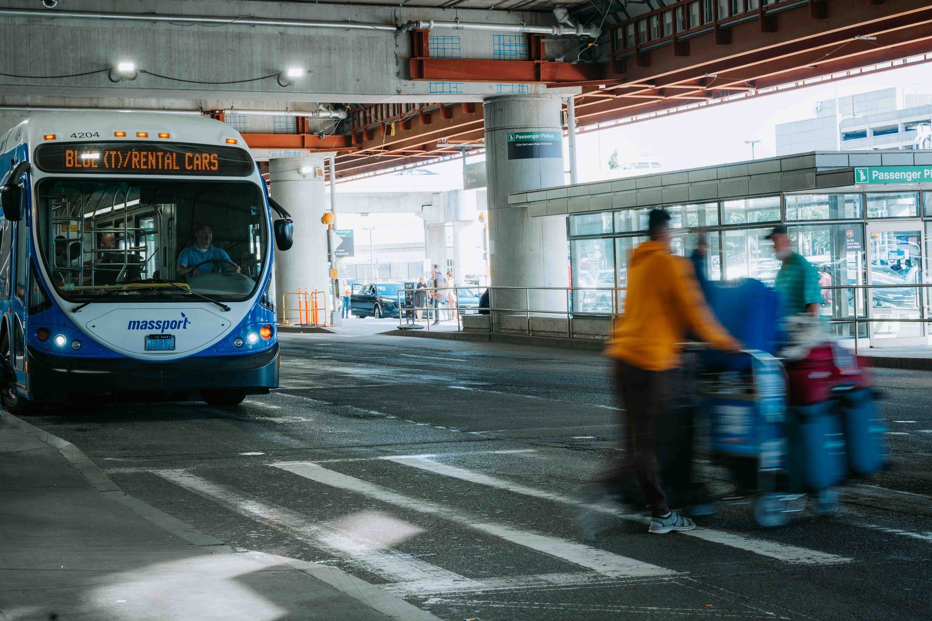 Public transit bus moving through downtown city street