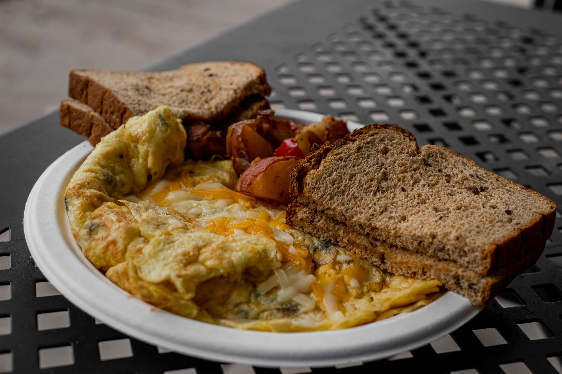 Plated breakfast dish with eggs at a sit-down restaurant