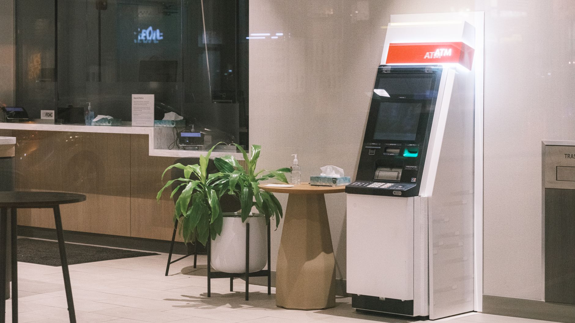 Bank teller counter where depositors interact with insured financial institutions
