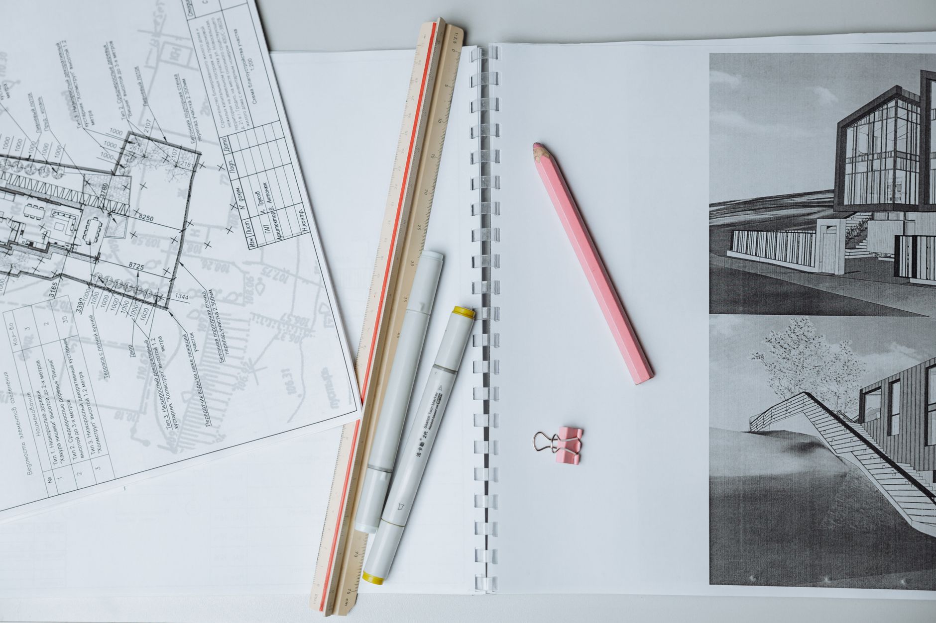 Construction blueprints and planning documents representing homebuilding development decisions