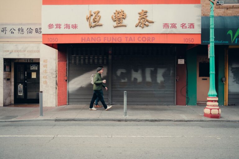 Empty commercial storefront with a closed sign in the window