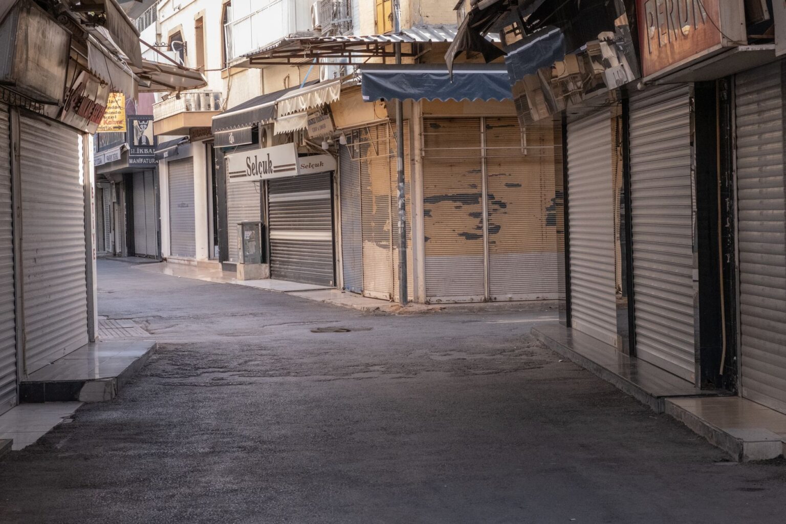 Commercial Rents Outpace Wage Growth as Small Tenant Renewals Stall Vacant commercial storefront with paper covering windows in an urban street