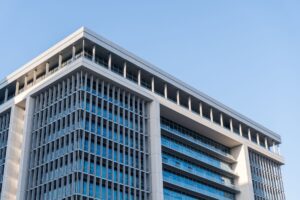 Corporate office building representing companies facing rising debt costs