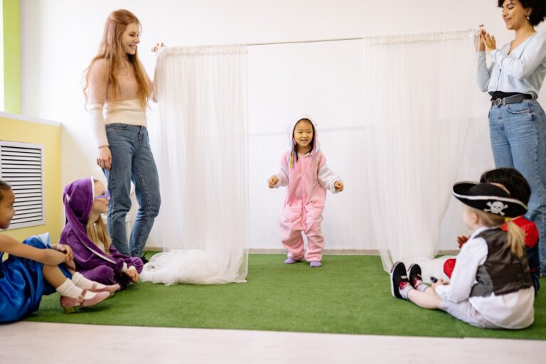 Empty infant room at a licensed childcare center with cribs and soft lighting