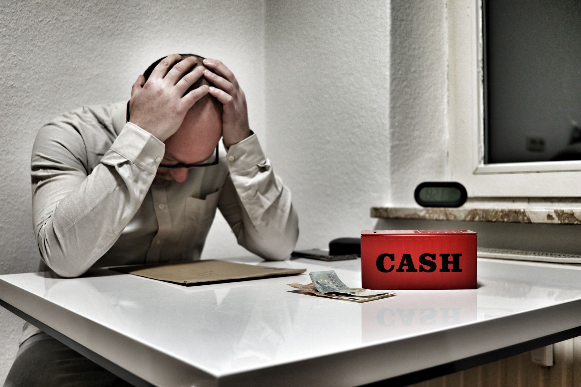 Legal documents and financial papers on a desk representing bankruptcy filing