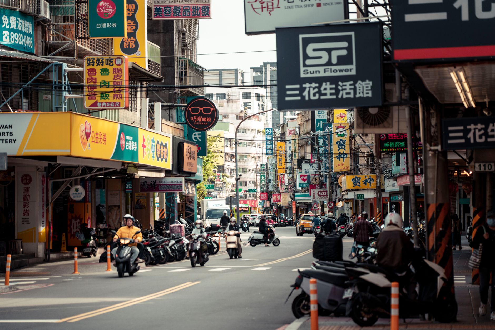 Row of small retail shops near a university campus