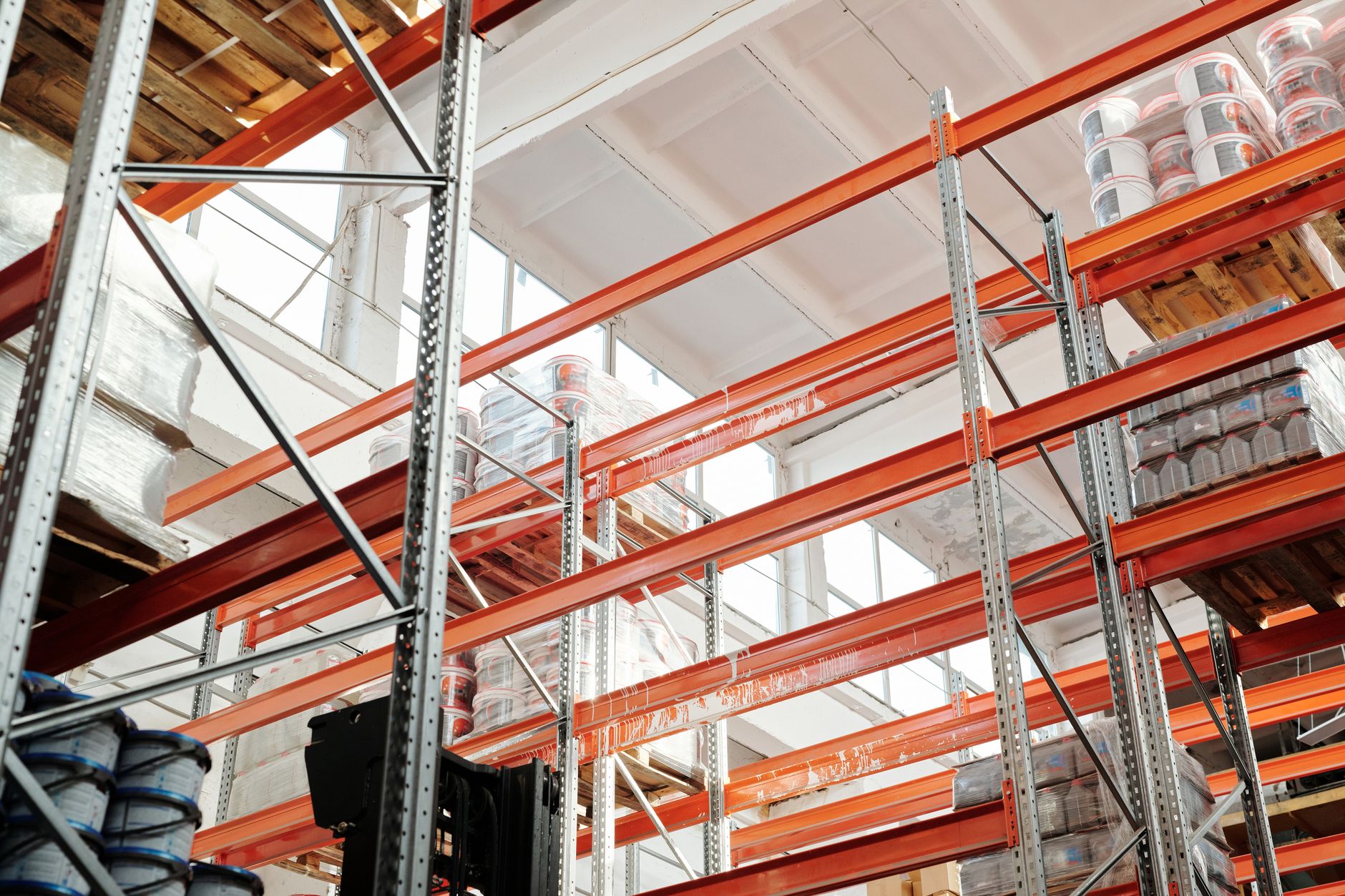 Workers inside a distribution warehouse managing freight and shipping operations