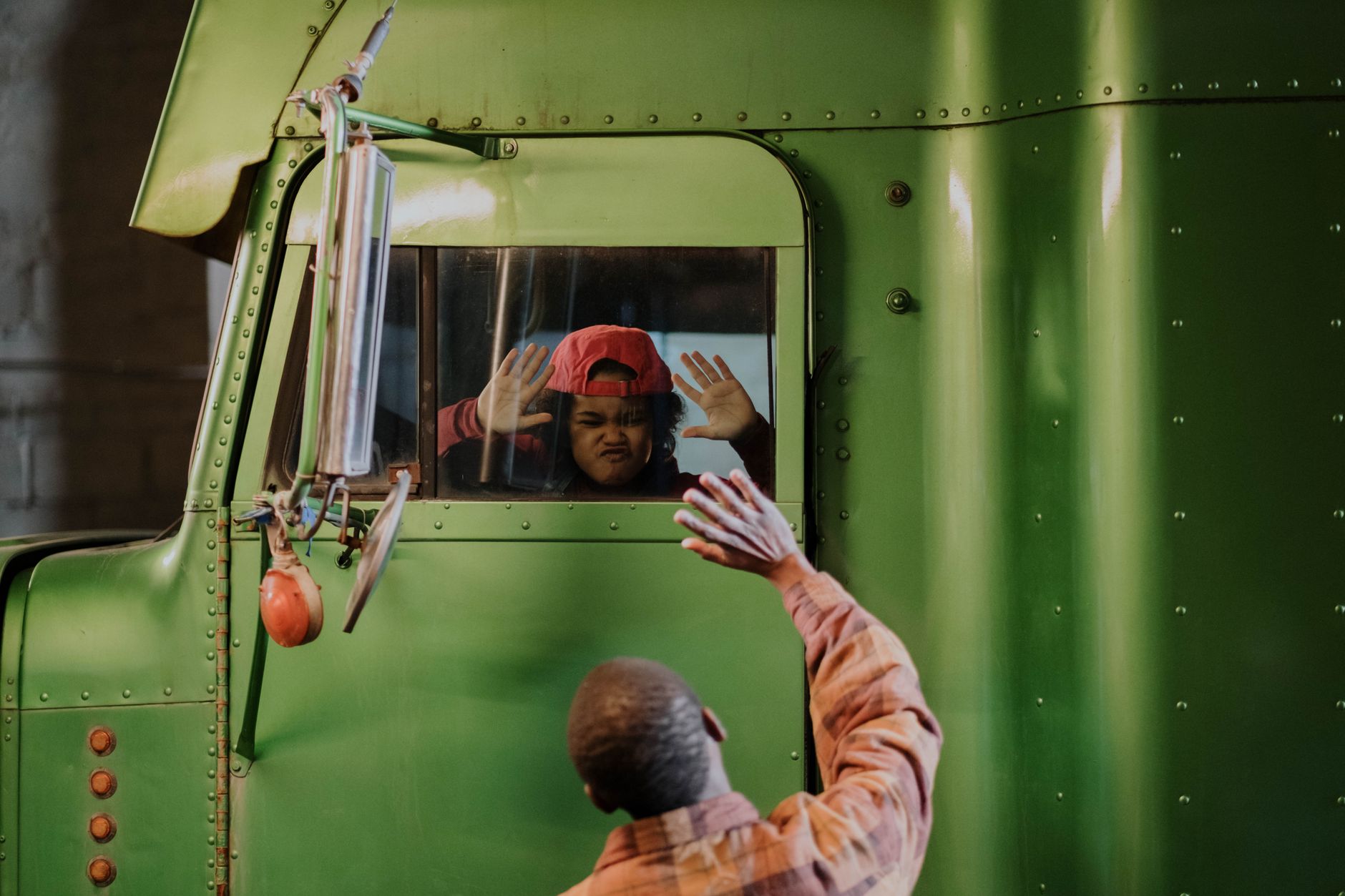 View from inside a truck cabin showing a driver on a long-haul route