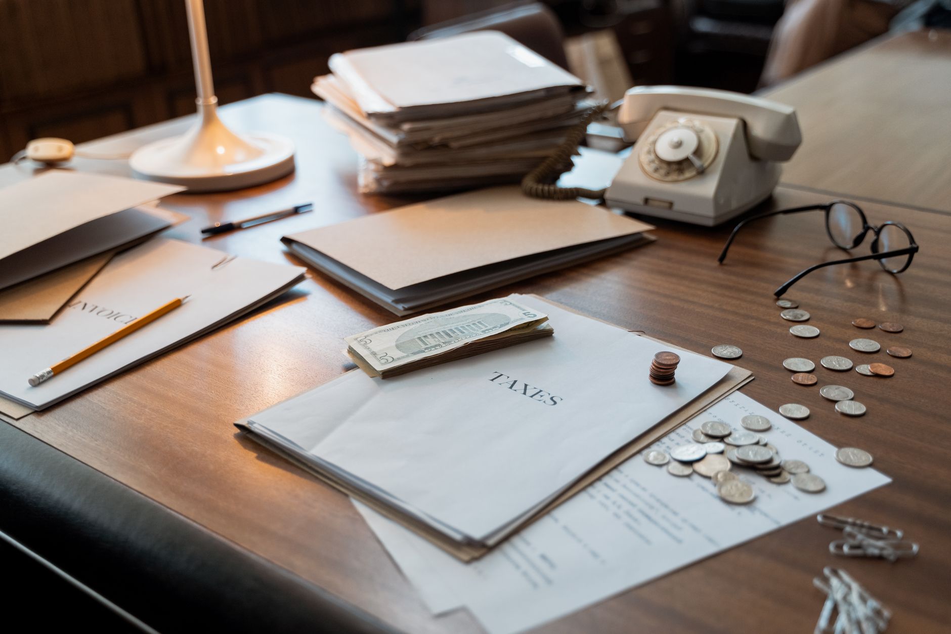 Banking documents and paperwork on a desk representing financial regulatory review