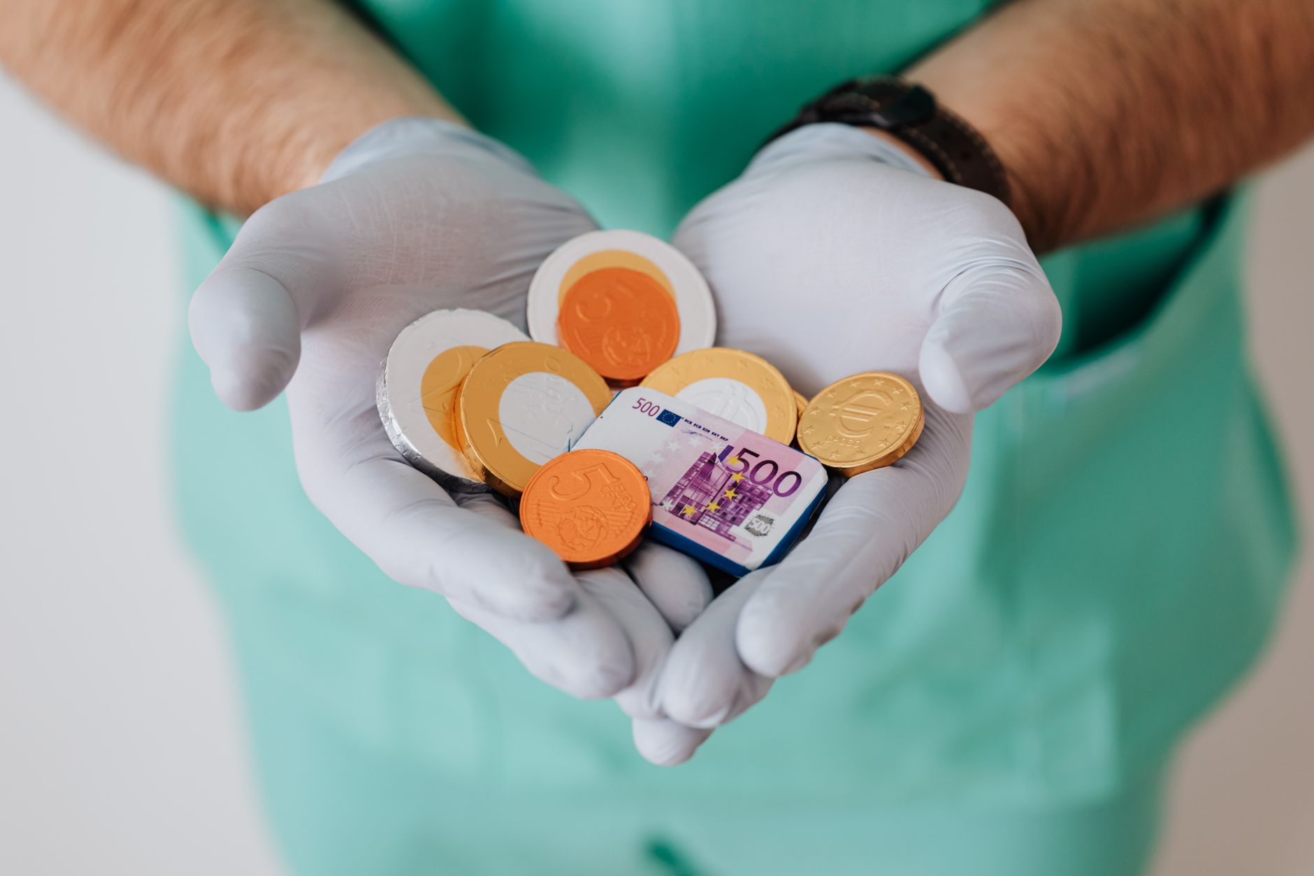 Person reviewing medical bills and prescription costs at a desk