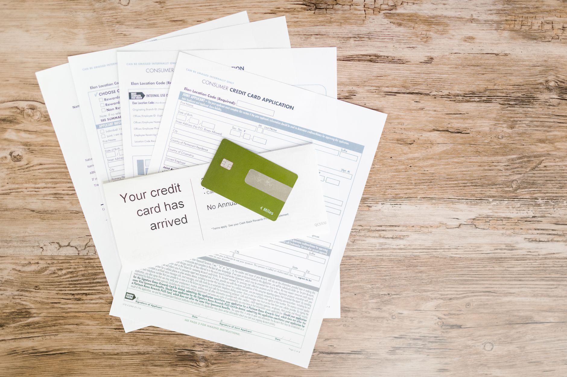 Financial documents and loan paperwork on a desk representing commercial real estate debt stress