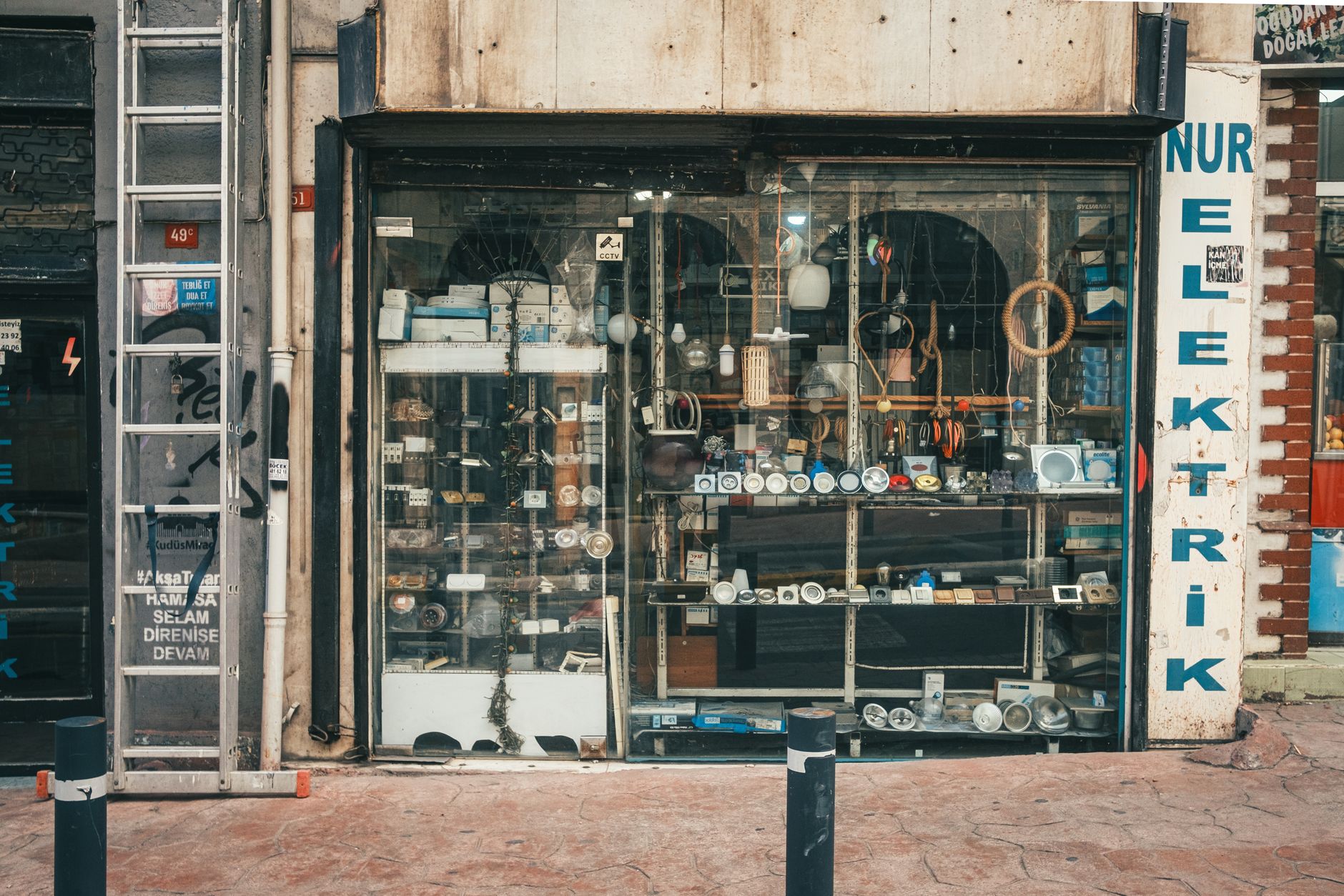 Vacant shop window with closed sign in a small town commercial district