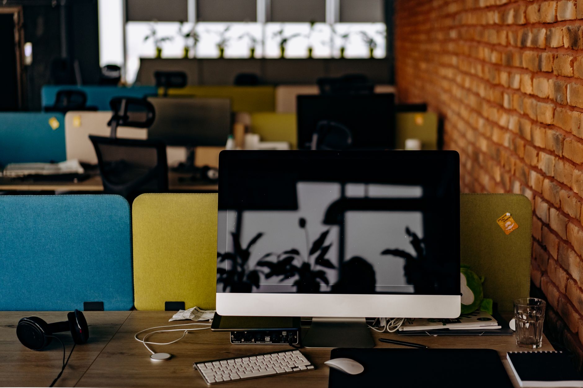 An empty desk in an office, representing workers who have left the labor force