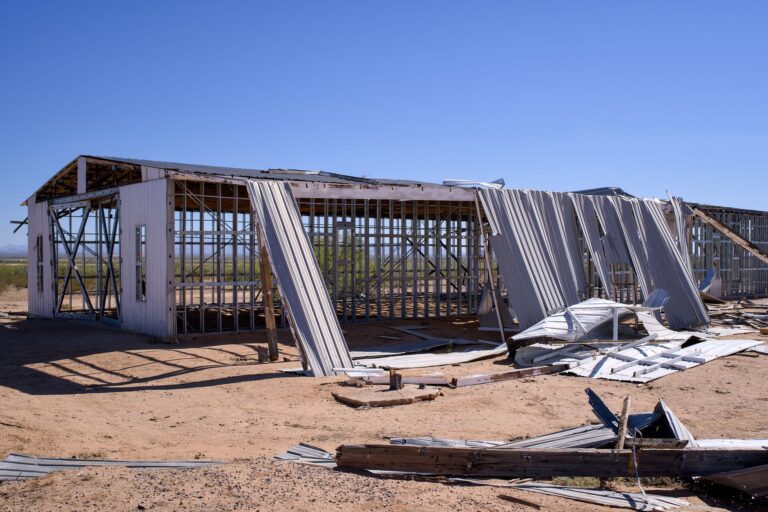 An idle construction site with unfinished structures and no visible workers