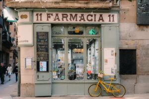 Retail Pharmacy Desert Expansion Strains Rural Medicare Part D Access Empty rural pharmacy storefront on a small town main street