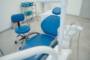 Medicaid Dental Benefit Rollbacks Quietly Strain Community Health Center Budgets Empty dental treatment chairs inside a community health clinic