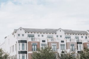 Section 8 Voucher Backlogs Deepen as HUD Construction Subsidies Stall Exterior of a residential apartment building representing affordable housing stock