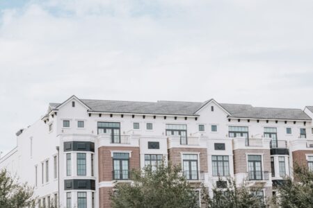 Section 8 Voucher Backlogs Deepen as HUD Construction Subsidies Stall Exterior of a residential apartment building representing affordable housing stock