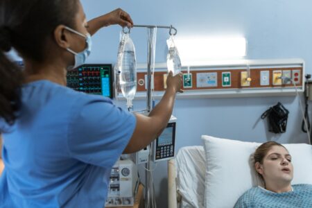 A dialysis patient receiving treatment at a medical facility