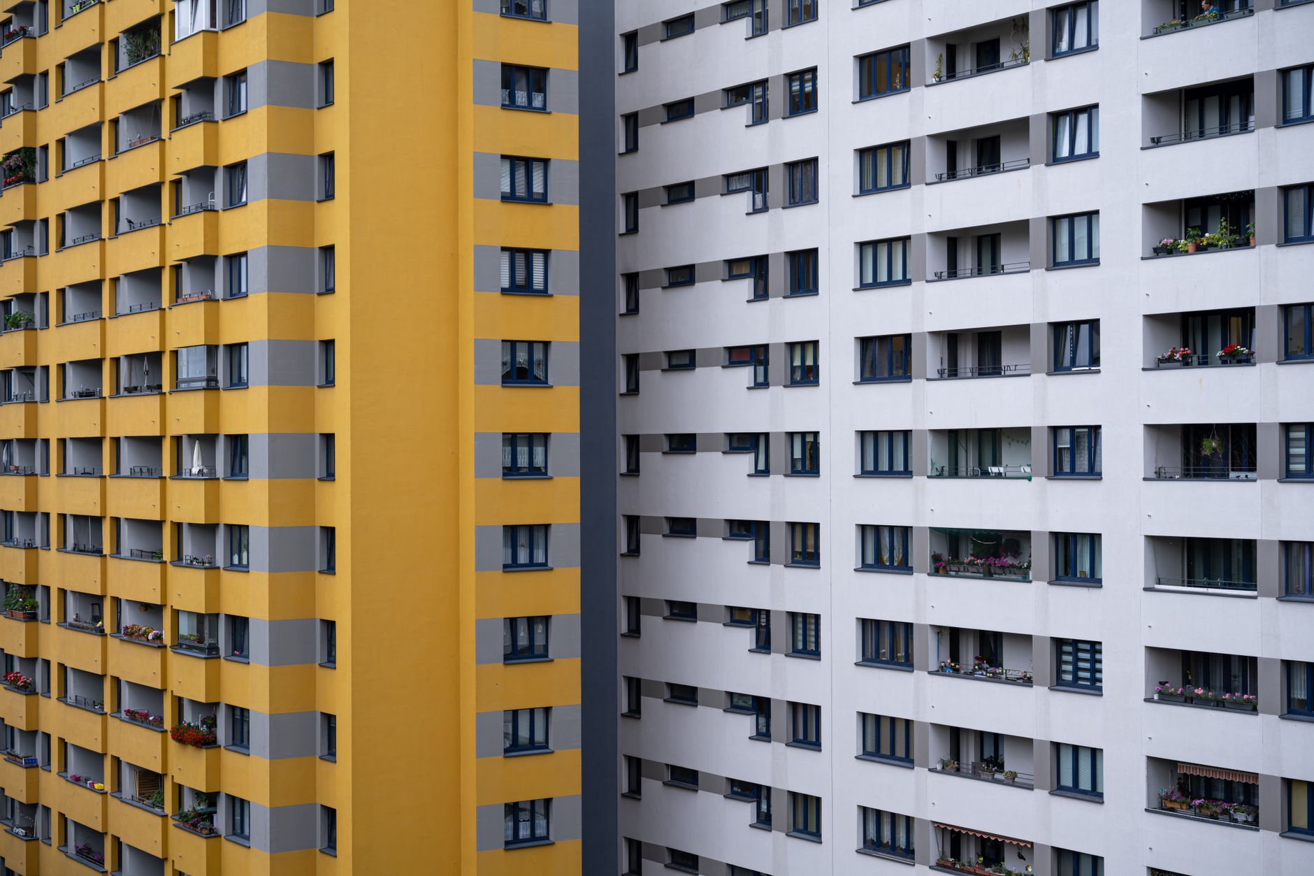 Multi-story urban apartment building representing affordable housing scarcity