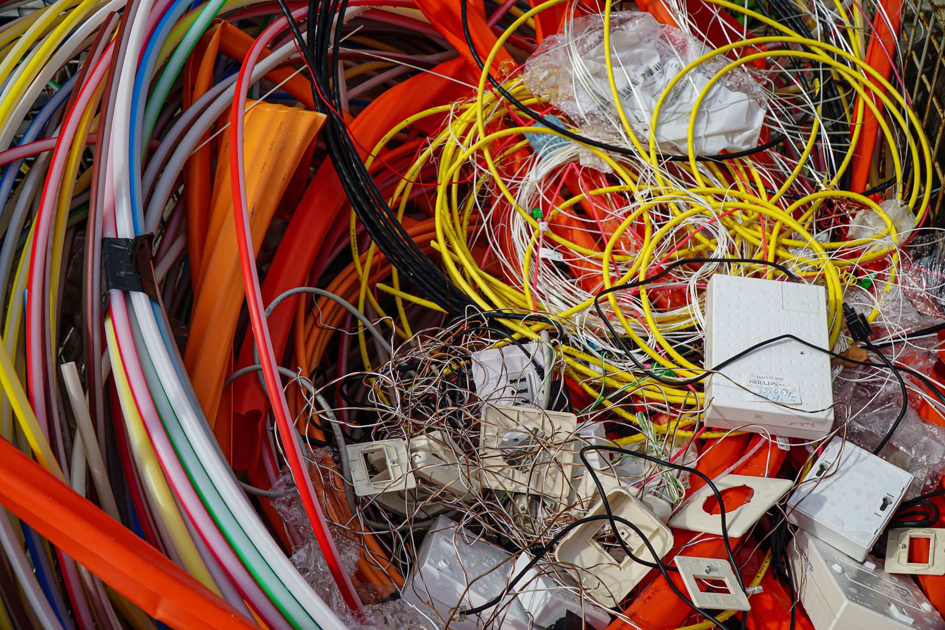 Close-up of stripped copper electrical wiring bundled together