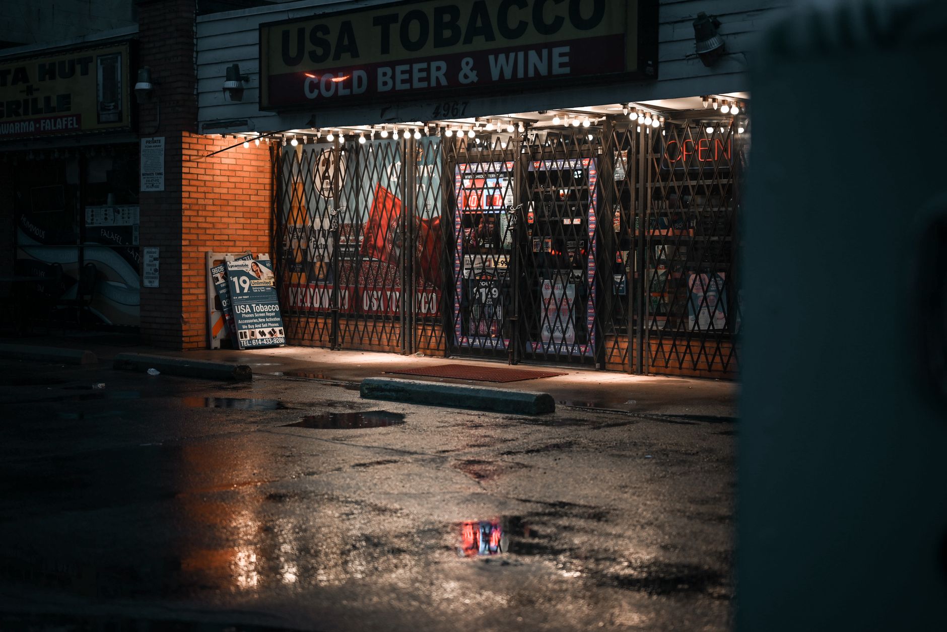 Vacant commercial storefront on an urban neighborhood street