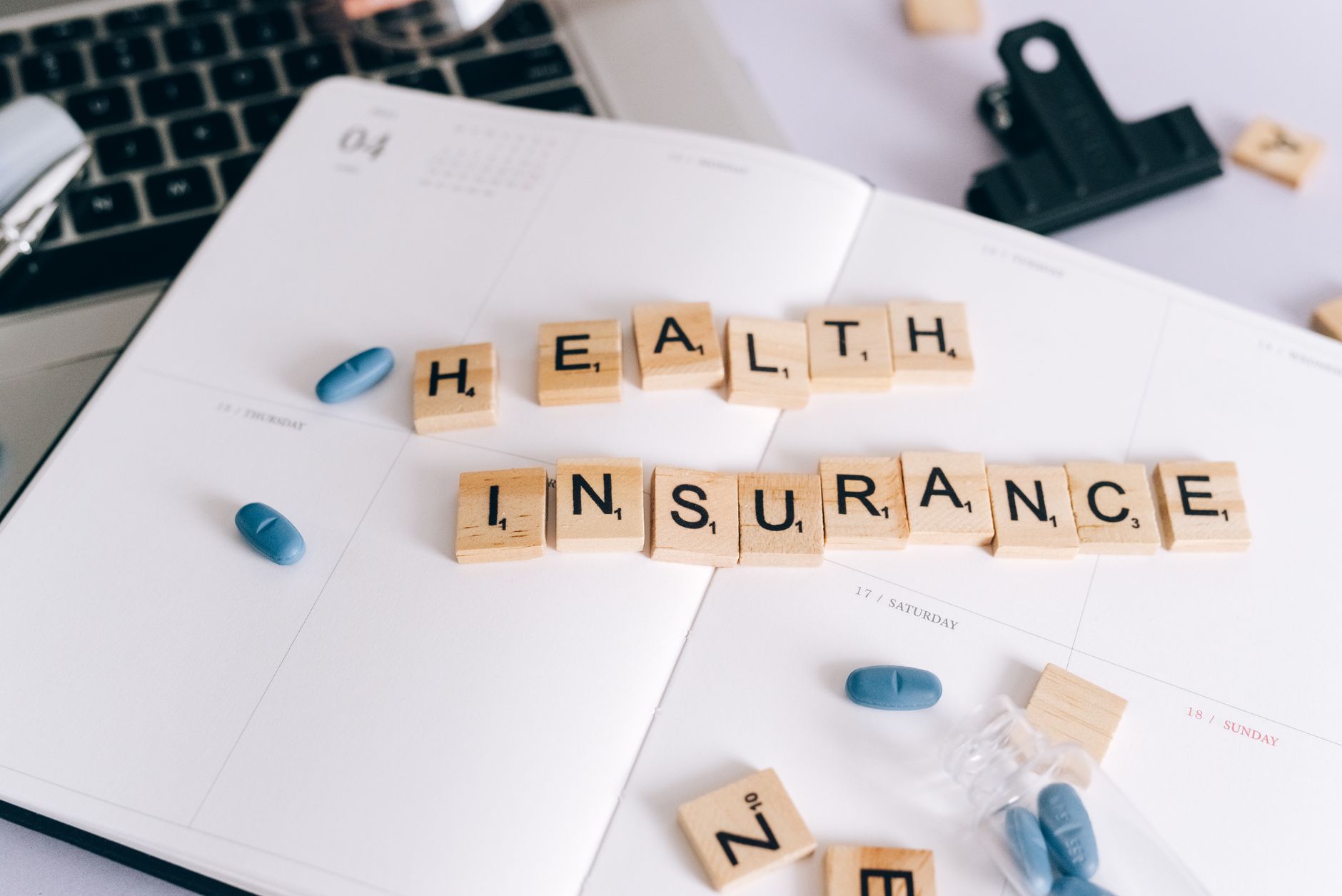 Medical professional reviewing financial charts and budget reports