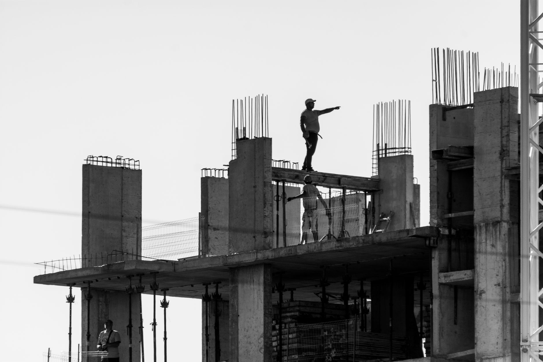 Workers on a job site representing skilled trades employment in solar installation