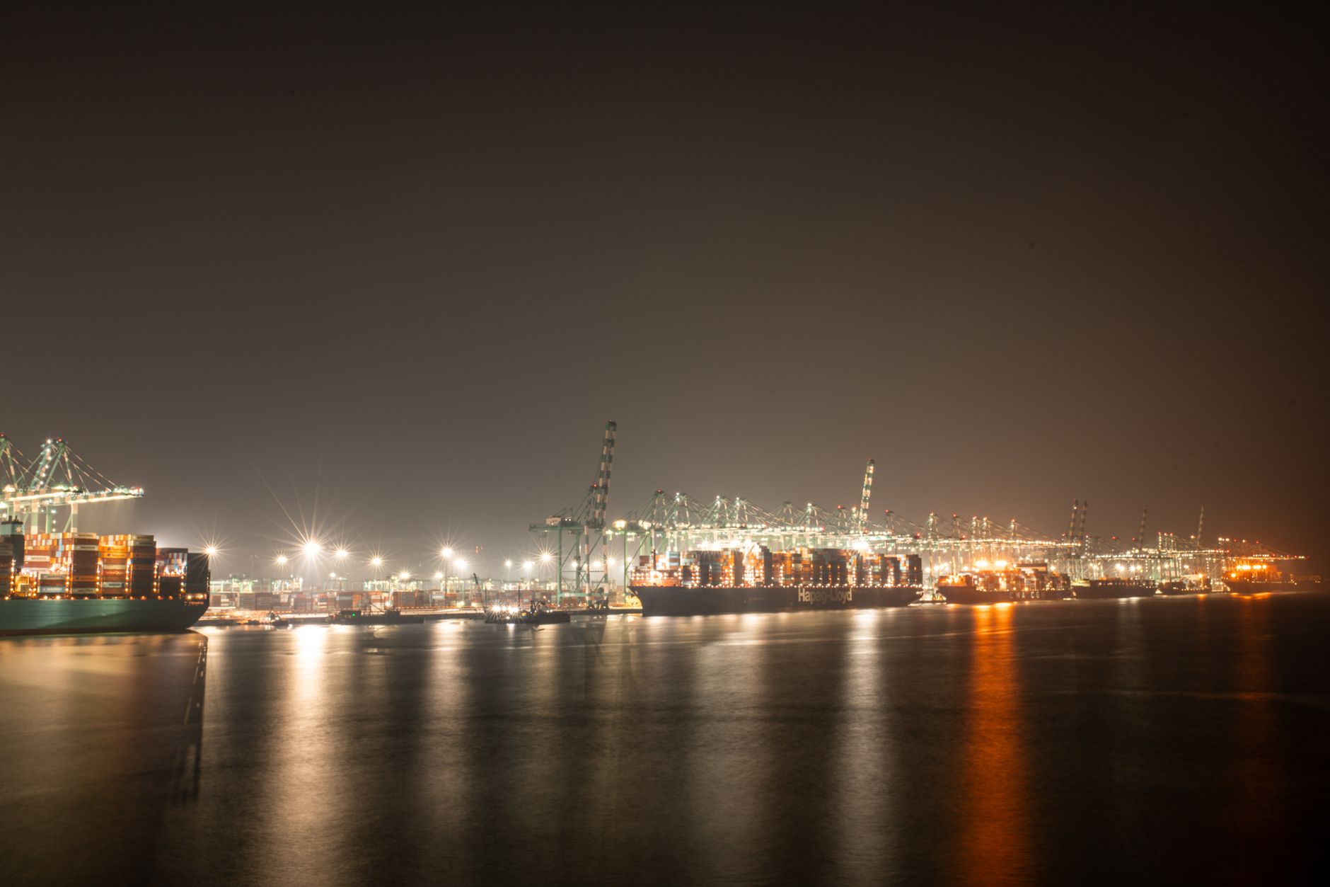 Stacked intermodal shipping containers at a cargo port terminal
