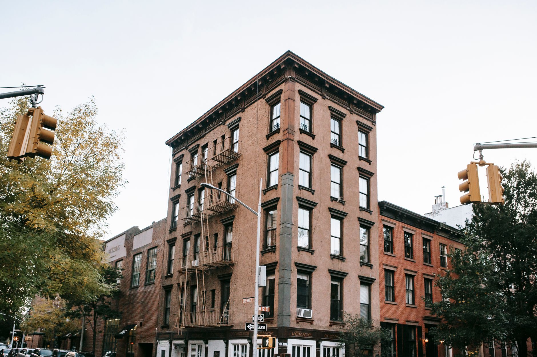 Low-income urban neighborhood corner with minimal retail presence