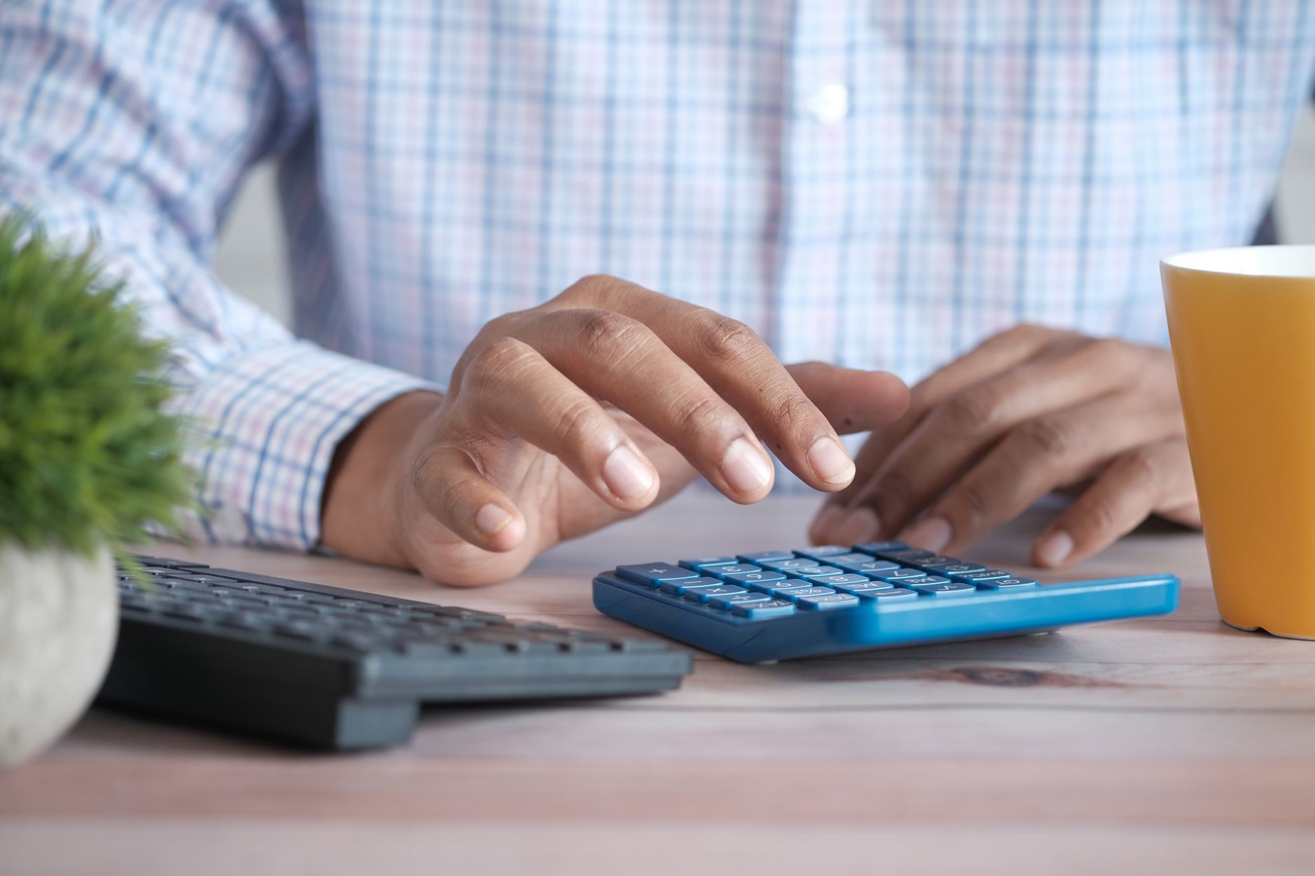 Budget spreadsheet and financial documents on a desk representing school district fiscal planning